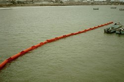 Navy oil terminal using Oil Spill Containment Booms in the Galapagos Islands Protection Project